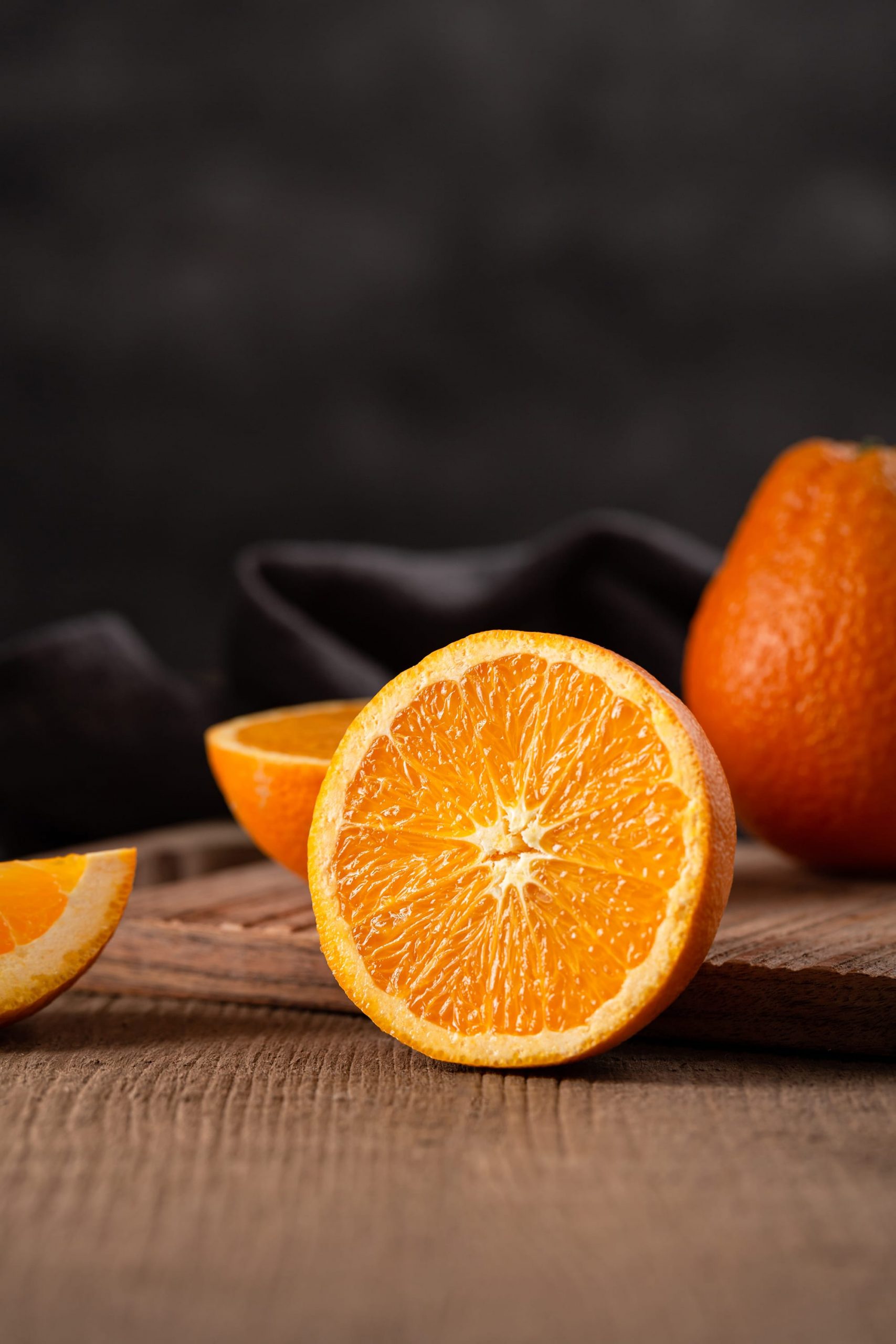 Orange half on wood table